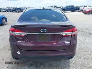 2018 Ford Fusion Titanium with VIN 3FA6P0K92JR114283, listed as a IAAI auction lot 42704476 with 92,502 mi miles and . Bid and sale history available at DreamBid. Image 16.