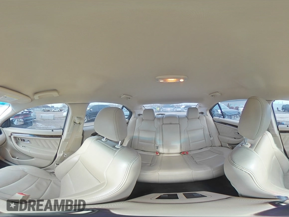 2015 Ford Taurus Limited с VIN 1FAHP2F85FG170755, выставлен на аукционе Copart как лот 87210804 с пробегом 96 982 миль миль и Списание • Salvage title. История ставок и продаж доступна на DreamBid. Изображение 14.