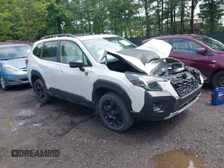 2023 Subaru Forester Wilderness with VIN JF2SKAMC2PH437606, listed as a IAAI auction lot 42745299 with 30,246 mi miles and . Bid and sale history available at DreamBid. Image 1.