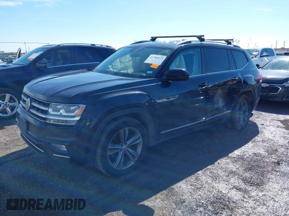 2018 Volkswagen Atlas SE with VIN 1V2FR2CA9JC537903, listed as a IAAI auction lot 41386874 with 118,764 mi miles and . Bid and sale history available at DreamBid. Image 18.