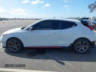 2019 Hyundai Veloster N with VIN KMHT36AH6KU001916, listed as a IAAI auction lot 41577775 with 77,471 mi miles. Bid and sale history available at carsss.com. Image 14.