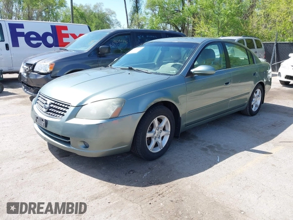 2005 Nissan Altima 2.5 S with VIN 1N4AL11D85C188734, listed as a IAAI auction lot 42064033 with 164,737 mi miles. Bid and sale history available at carsss.com. Image 2.