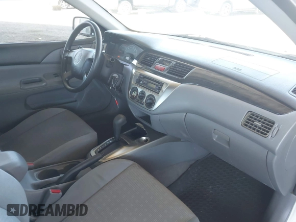 2004 Mitsubishi Lancer ES z VIN JA3AJ26E14U065498, wystawiony jako IAAI lot #41887945 z przebiegiem 142 632 mil mil oraz . Historia ofert i sprzedaży dostępna na DreamBid. Obrazek 5.