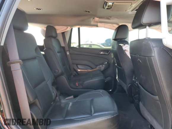2019 Chevrolet Tahoe Premier with VIN 1GNSKCKJ4KR406220, listed as a Copart auction lot 50491344 with 37,254 mi miles and Salvage title. Bid and sale history available at DreamBid. Image 12.