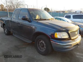 1999 Ford F-150 XL with VIN 1FTRX17L3XKB32547, listed as a IAAI auction lot 41331882 with 1 mi miles. Bid and sale history available at carsss.com. Image 1.