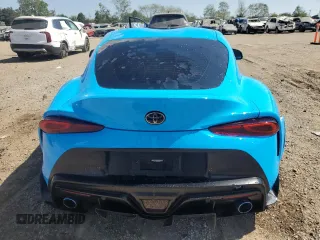 2021 Toyota GR Supra 2.0 with VIN WZ1DB2C04MW039858, listed as a Copart auction lot 70049874 with 10,586 mi miles and Salvage Title. Bid and sale history available at carsss.com. Image 6.
