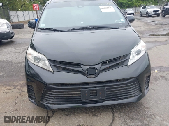 2018 Toyota Sienna L with VIN 5TDZZ3DC7JS912142, listed as a IAAI auction lot 42330428 with 221,498 mi miles and . Bid and sale history available at DreamBid. Image 6.