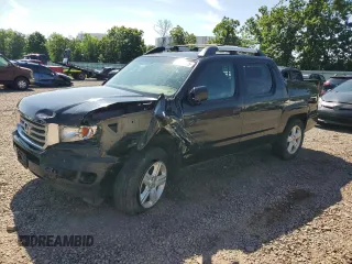 2012 Honda Ridgeline RTL with VIN 5FPYK1F53CB457629, listed as a Copart auction lot 62525375 with 143,295 mi miles and Salvage title. Bid and sale history available at DreamBid. Image 1.