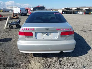 1999 Honda Civic EX with VIN 1HGEJ8242XL025414, listed as a IAAI auction lot 41736378 with 206,342 mi miles. Bid and sale history available at carsss.com. Image 16.