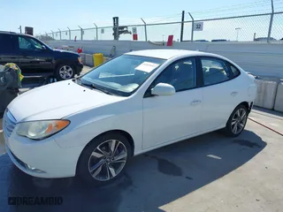 2010 Hyundai Elantra SE with VIN KMHDU4AD5AU037985, listed as a IAAI auction lot 41889053 with 156,697 mi miles. Bid and sale history available at carsss.com. Image 19.