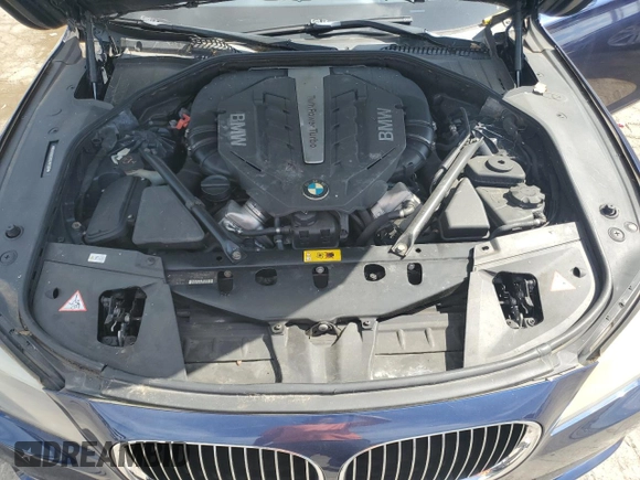 2012 BMW 7 Series with VIN WBAKX6C58CC197207, listed as a Copart auction lot 84153784 with 130,049 mi miles and Salvage title. Bid and sale history available at DreamBid. Image 11.