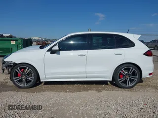 2013 Porsche Cayenne GTS with VIN WP1AD2A25DLA77759, listed as a IAAI auction lot 42316241 with 212,034 mi miles and . Bid and sale history available at DreamBid. Image 14.