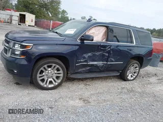 2019 Chevrolet Tahoe LT with VIN 1GNSCBKC7KR133119, listed as a IAAI auction lot 41570650 with 114,575 mi miles and . Bid and sale history available at DreamBid. Image 14.
