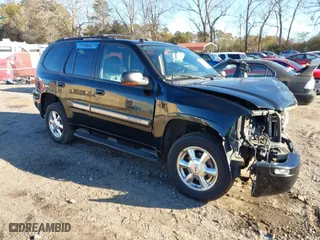 2005 GMC Envoy SLE with VIN 1GKDS13S152246568, listed as a IAAI auction lot 41293887 with 315,882 mi miles. Bid and sale history available at carsss.com. Image 1.