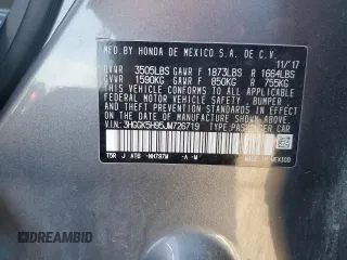 2018 Honda Fit EX-L with VIN 3HGGK5H95JM726719, listed as a Copart auction lot 59015325 with Not provided miles and Salvage title. Bid and sale history available at DreamBid. Image 12.