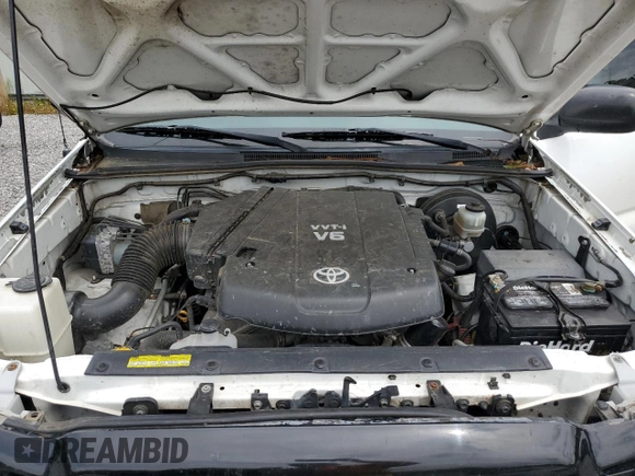 2011 Toyota Tacoma PreRunner z VIN 3TMJU4GN1BM124215, wystawiony jako Copart lot #55755385 z przebiegiem 153 806 mil mil oraz Czysty tytuł • Clean title. Historia ofert i sprzedaży dostępna na DreamBid. Obrazek 11.