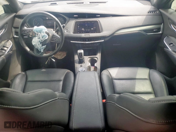 2019 Cadillac XT4 FWD Premium Luxury with VIN 1GYFZCR47KF175802, listed as a Copart auction lot 57153785 with 33,308 mi miles and Salvage title. Bid and sale history available at DreamBid. Image 8.