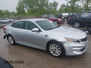 2016 Kia Optima LX z VIN 5XXGT4L37GG010780, wystawiony jako IAAI lot #42320573 z przebiegiem 154 662 mil mil oraz . Historia ofert i sprzedaży dostępna na DreamBid. Obrazek 13.