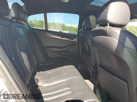 2018 BMW 5 Series 530e with VIN WBAJA9C52JG623073, listed as a Copart auction lot 82718984 with 79,543 mi miles and Clean title. Bid and sale history available at DreamBid. Image 10.