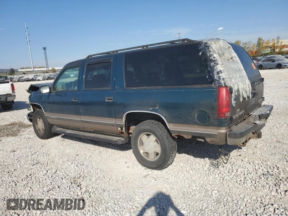1997 GMC Suburban z VIN 3GKFK16R7VG514905, wystawiony jako Copart lot #77410934 z przebiegiem 193 116 mil mil oraz Szkoda całkowita • Salvage title. Historia ofert i sprzedaży dostępna na DreamBid. Obrazek 2.