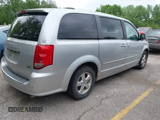 2011 Dodge Grand Caravan Crew with VIN 2D4RN5DG7BR786789, listed as a IAAI auction lot 42141124 with 167,353 mi miles and . Bid and sale history available at DreamBid. Image 4.