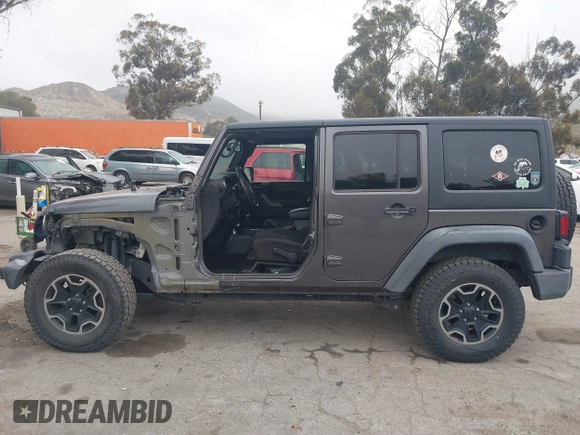 2014 Jeep Wrangler Unlimited Sport with VIN 1C4BJWDG7EL244749, listed as a IAAI auction lot 41871127 with 128,420 mi miles and . Bid and sale history available at DreamBid. Image 15.