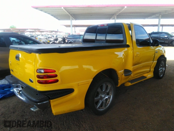 2002 Ford F-150 XL with VIN 1FTRF07L52KB68889, listed as a IAAI auction lot 39266273 with 84,900 mi miles and . Bid and sale history available at DreamBid. Image 4.