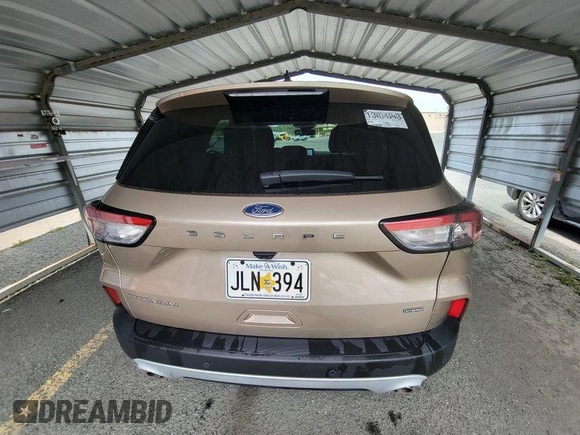 2020 Ford Escape Titanium Hybrid with VIN 1FMCU0DZ5LUB81972, listed as a IAAI auction lot 42679188 with 19,400 mi miles and . Bid and sale history available at DreamBid. Image 16.