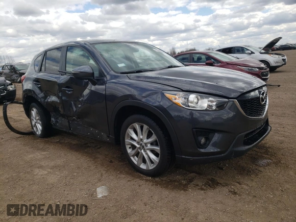 2015 Mazda CX-5 Grand Touring with VIN JM3KE4DY2F0526535, listed as a Copart auction lot 53046855 with 90,288 mi miles and Salvage Title. Bid and sale history available at DreamBid. Image 4.