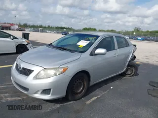 2010 Toyota Corolla with VIN 1NXBU4EE0AZ351330, listed as a IAAI auction lot 42622350 with 129,361 mi miles and . Bid and sale history available at DreamBid. Image 2.