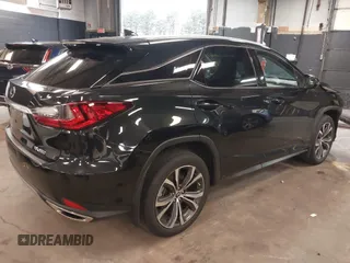 2021 Lexus RX with VIN 2T2HZMDA2MC279445, listed as a IAAI auction lot 41913178 with 38,598 mi miles. Bid and sale history available at carsss.com. Image 4.