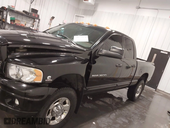 2005 Dodge Ram 3500 SLT with VIN 3D7LS38C85G810265, listed as a IAAI auction lot 41856058 with 164,027 mi miles. Bid and sale history available at carsss.com. Image 14.