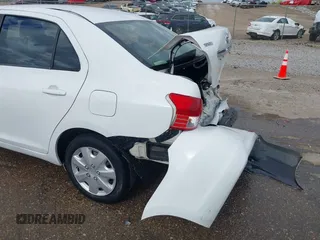 2010 Toyota Yaris with VIN JTDBT4K3XA1376716, listed as a IAAI auction lot 40864128 with 197,283 mi miles. Bid and sale history available at carsss.com. Image 18.