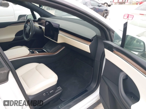 2022 Tesla Model X with VIN 7SAXCBE56NF364067, listed as a IAAI auction lot 40947378 with Not Provided miles and . Bid and sale history available at DreamBid. Image 5.