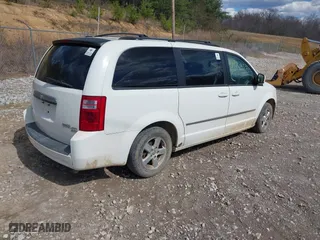 2010 Dodge Grand Caravan SXT with VIN 2D4RN5D12AR120322, listed as a IAAI auction lot 41876293 with 1 mi miles. Bid and sale history available at carsss.com. Image 4.