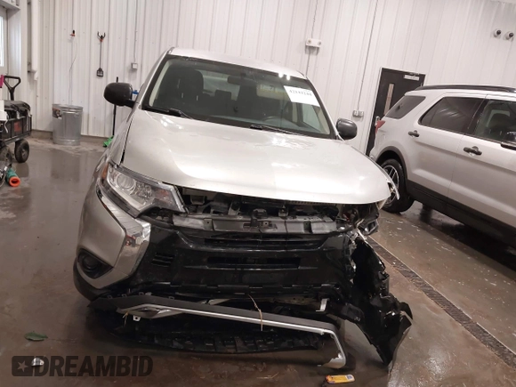 2020 Mitsubishi Outlander ES z VIN JA4AZ3A38LZ018227, wystawiony jako IAAI lot #42142244 z przebiegiem 91 342 mil mil oraz . Historia ofert i sprzedaży dostępna na DreamBid. Obrazek 13.