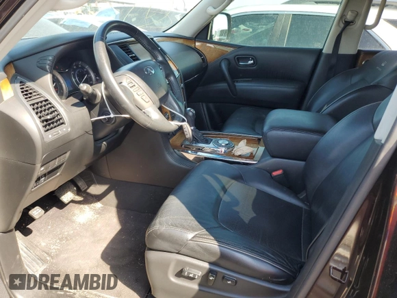 2014 Infiniti QX80 with VIN JN8AZ2ND9E9750604, listed as a Copart auction lot 57026004 with 144,732 mi miles and Clean Title. Bid and sale history available at carsss.com. Image 7.
