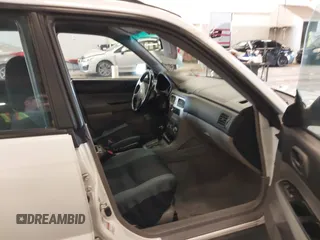 2003 Subaru Forester X with VIN JF1SG63653H762212, listed as a IAAI auction lot 41841892 with 152,059 mi miles. Bid and sale history available at carsss.com. Image 5.