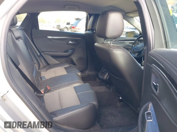 2016 Chevrolet Impala LT with VIN 2G1105SAXG9141836, listed as a IAAI auction lot 40740284 with 141,195 mi miles and . Bid and sale history available at DreamBid. Image 8.