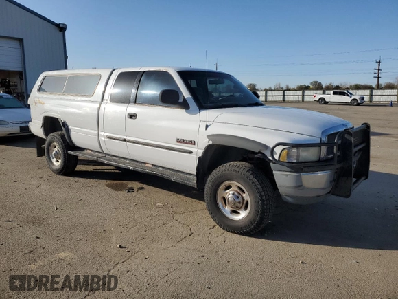 2001 Dodge 2500 z VIN 1B7KF23621J521123, wystawiony jako Copart lot #49670345 z przebiegiem 248 027 mil mil oraz Szkoda całkowita • Salvage title. Historia ofert i sprzedaży dostępna na DreamBid. Obrazek 4.