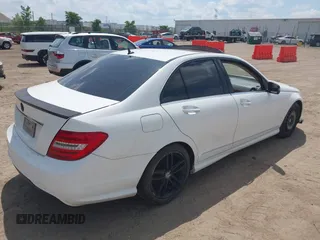 2014 Mercedes-Benz C 250 Sport with VIN WDDGF4HB5EA947035, listed as a IAAI auction lot 42538526 with 119,858 mi miles and . Bid and sale history available at DreamBid. Image 4.