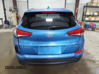2018 Hyundai Tucson SEL with VIN KM8J3CA45JU704523, listed as a Copart auction lot 61654034 with 87,607 mi miles and Salvage Title. Bid and sale history available at carsss.com. Image 6.