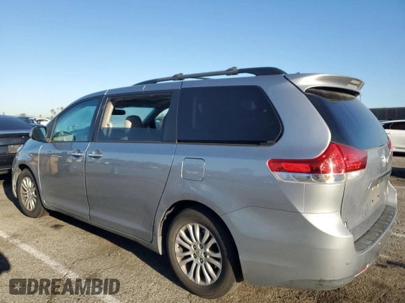 2011 Toyota Sienna XLE AAS with VIN 5TDYK3DC5BS166856, listed as a Copart auction lot 50077455 with 171,649 mi miles and Salvage Title. Bid and sale history available at carsss.com. Image 2.