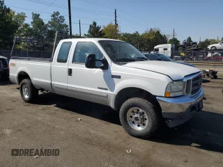 2003 Ford Super Duty F-250 XL with VIN 1FTNX21F73EA48988, listed as a Copart auction lot 74278654 with 174,738 mi miles and Salvage Title. Bid and sale history available at carsss.com. Image 4.