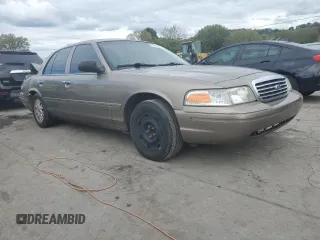 2005 Ford Crown Victoria LX z VIN 2FAFP74W95X147431, wystawiony jako Copart lot #73487374 z przebiegiem 203 107 mil mil oraz Nie do naprawy • Non repairable. Historia ofert i sprzedaży dostępna na DreamBid. Obrazek 4.