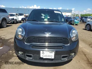 2013 MINI Countryman S ALL4 z VIN WMWZC5C54DWP34353, wystawiony jako Copart lot #57059295 z przebiegiem 154 012 mil mil oraz Szkoda całkowita • Salvage title. Historia ofert i sprzedaży dostępna na DreamBid. Obrazek 5.