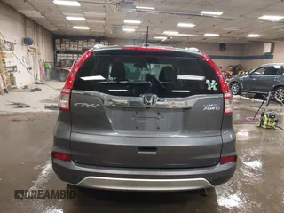 2015 Honda CR-V EX-L with VIN 2HKRM4H75FH604059, listed as a IAAI auction lot 41869535 with 131,848 mi miles. Bid and sale history available at carsss.com. Image 17.