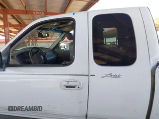 2003 Ford F-150 XL with VIN 1FTRX18L03NA45728, listed as a IAAI auction lot 41860421 with 179,596 mi miles. Bid and sale history available at carsss.com. Image 14.