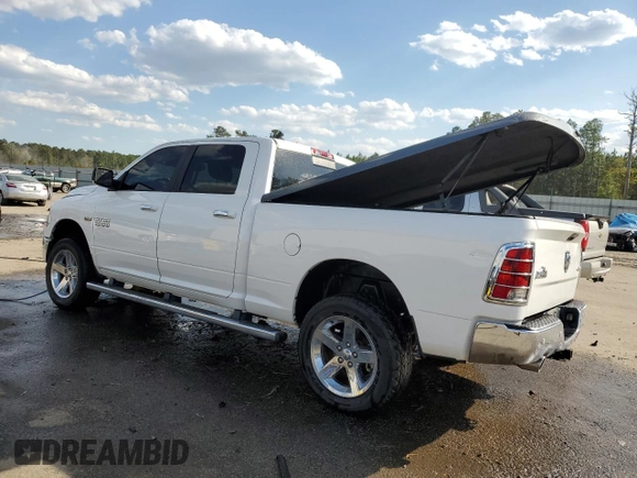 2018 Ram 1500 Outdoorsman with VIN 1C6RR7TT4JS177868, listed as a Copart auction lot 50699295 with 124,974 mi miles and Salvage title. Bid and sale history available at DreamBid. Image 2.