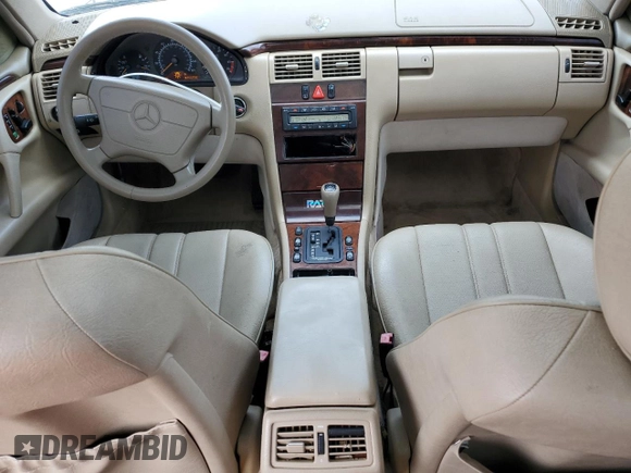 1998 Mercedes-Benz E-Class with VIN WDBJH65F7WA546101, listed as a Copart auction lot 47098945 with 227,453 mi miles and Salvage Title. Bid and sale history available at carsss.com. Image 8.